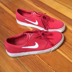 Men’s red Nike’s